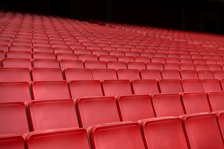 Red Seats in an Empty Stadium